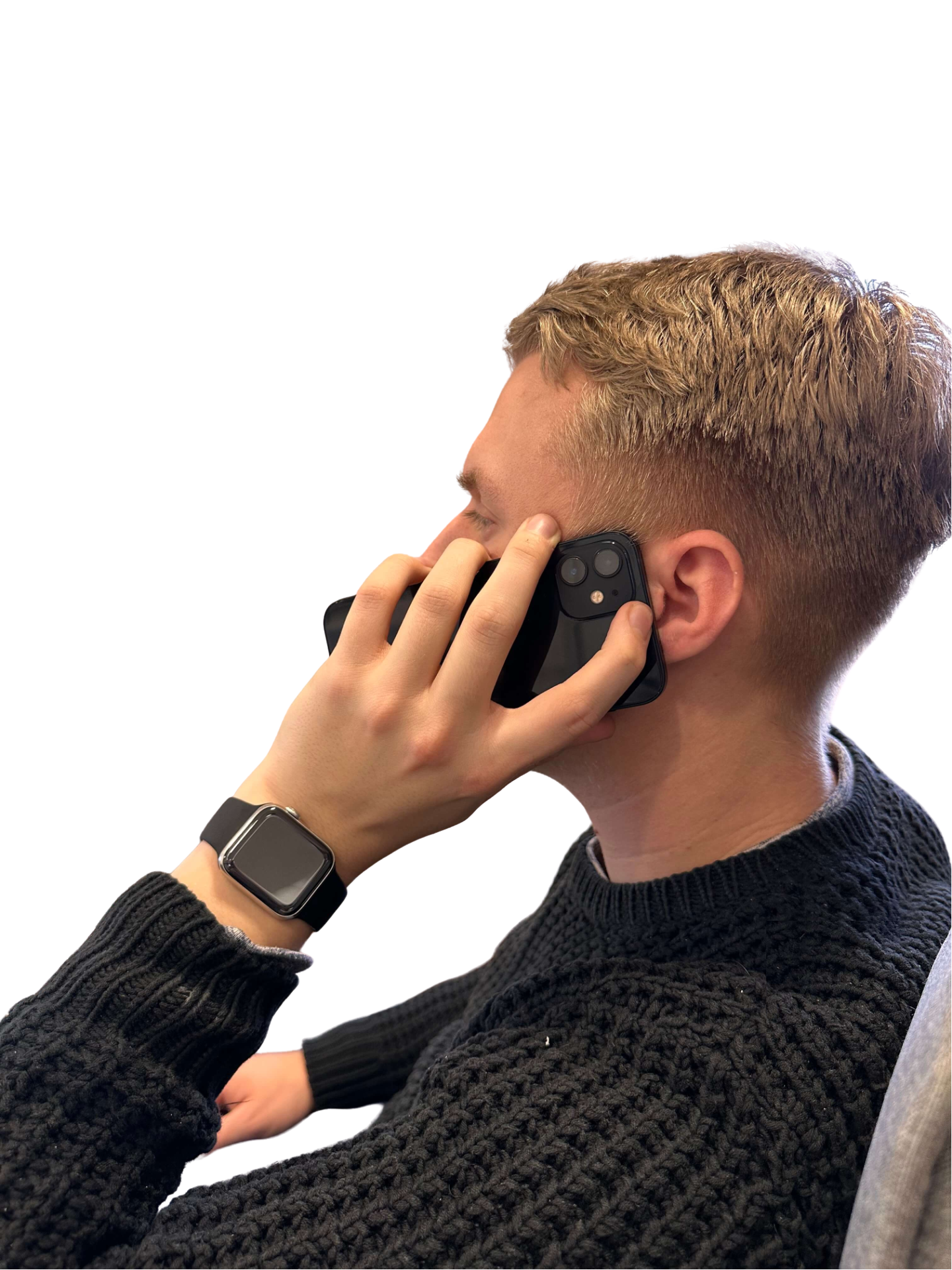 man at desk using a mobile phone